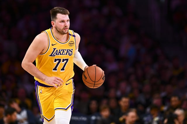 Apr 11, 2025; Los Angeles, California, USA; Los Angeles Lakers guard Luka Doncic (77) moves the ball against the Houston Rockets during the first half at Crypto.com Arena. Mandatory Credit: Jonathan Hui-Imagn Images/ File Photo