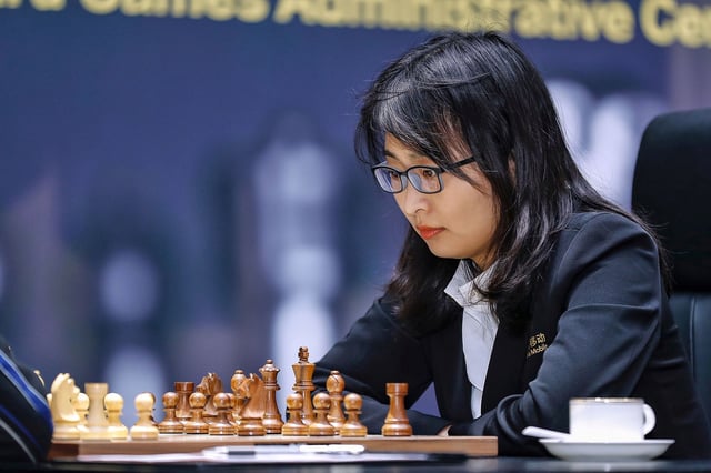 This photo taken on January 5, 2020 shows Ju Wenjun of China competing against Aleksandra Goryachkina of Russia (not pictured) during the 2020 International Chess Federation (FIDE) Women's World Chess Championship in Shanghai. - Two of the sharpest minds in women's chess are doing battle this week in Shanghai with a record prize fund and world champion title on the line. (Photo by STR / AFP) / China OUT / TO GO WITH Chess-world-women-CHN,FOCUS by Peter STEBBINGS (Photo by STR/AFP via Getty Images)
