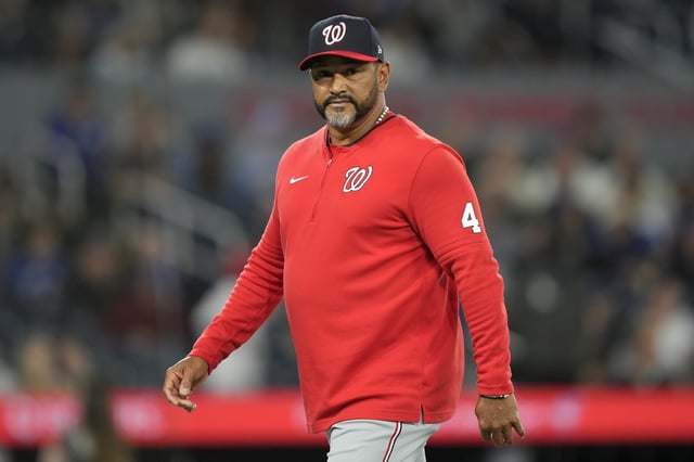 Apr 1, 2025; Toronto, Ontario, CAN; Washington Nationals manager Dave Martinez (4) walks back to the dugout after visiting the pitcher’s mound during the eighth inning against the Toronto Blue Jays at Rogers Centre. Mandatory Credit: John E. Sokolowski-Imagn Images/ File Photo