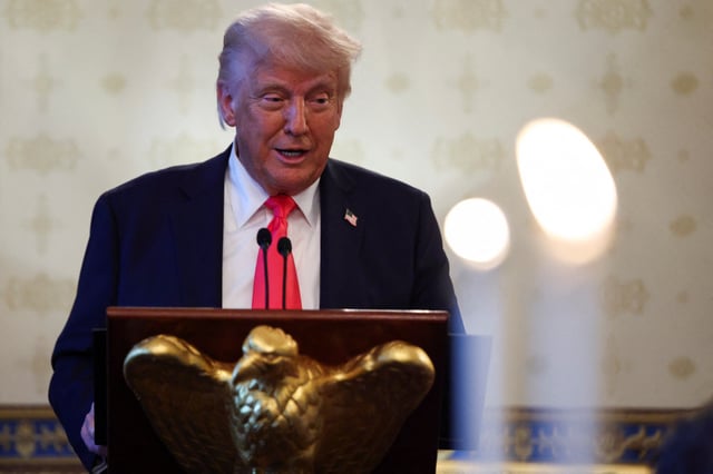 U.S. President Donald Trump speaks during a prayer service and dinner ahead of Easter Sunday, at the White House in Washington, D.C., U.S., April 16, 2025. REUTERS/Evelyn Hockstein