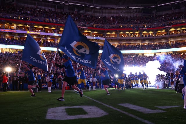 Jan 13, 2025; Glendale, AZ, USA; The Los Angeles Rams take the field before the game against the Minnesota Vikings in an NFC wild card game at State Farm Stadium. Mandatory Credit: Mark J. Rebilas-Imagn Images/File photo