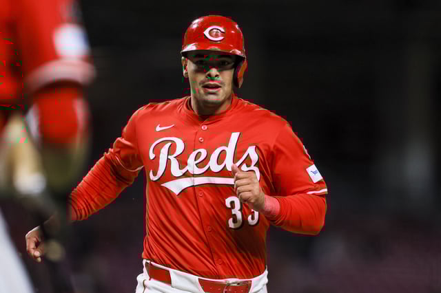 Apr 16, 2025; Cincinnati, Ohio, USA; Cincinnati Reds first baseman Christian Encarnacion-Strand (33) scores on a RBI single hit by catcher Jose Trevino (not pictured) in the seventh inning against the Seattle Mariners at Great American Ball Park. Mandatory Credit: Katie Stratman-Imagn Images/File photo
