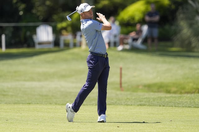 Apr 17, 2025; Hilton Head, South Carolina, USA; Justin Thomas hits his approach shot to eight green during the first round of the RBC Heritage golf tournament. Mandatory Credit: Jim Dedmon-Imagn Images