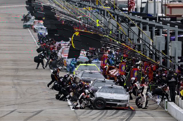 Ryan Blaney, driver of the #12 BodyArmor Zero Sugar Ford, pits during the NASCAR Cup Series Ambetter Health 400 at Atlanta Motor Speedway on February 23, 2025 in Hampton, Georgia.