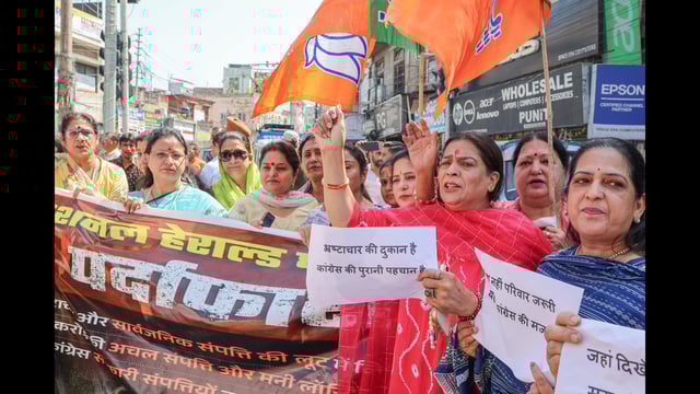 Bharatiya Janata Party (BJP) workers protest over the Enforcement Directorate filing a chargesheet against Party Parliamentary Party chairperson Sonia Gandhi, Lok Sabha LoP and party MP Rahul Gandhi and others on charges of money laundering in the National Herald case, in Jammu on Thursday. (Aman Sharma)