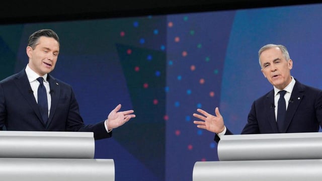 Conservative Leader Pierre Poilievre (left) and Liberal Leader Mark Carney participate in the English-language federal leaders’ debate in Montreal, Canada, on Thursday. (REUTERS)