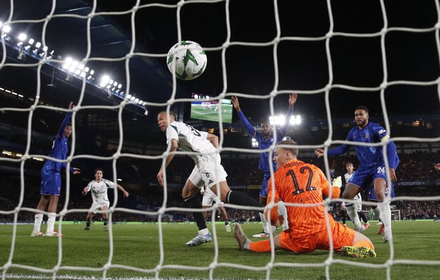 Soccer Football - Conference League - Quarter Final - Second Leg - Chelsea v Legia Warsaw - Stamford Bridge, London, Britain - April 17, 2025 Legia Warsaw's Steve Kapuadi scores their second goal past Chelsea's Filip Jorgensen Action Images via Reuters/Paul Childs