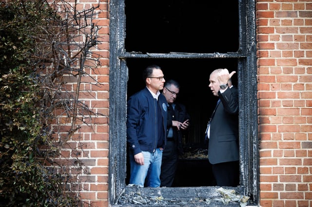 Pennsylvania Gov. Josh Shapiro in conversation ahead of providing an update on the act of arson that took place at the Governor's Residence, in Harrisburg, Pennsylvania, on April 13, 2025.