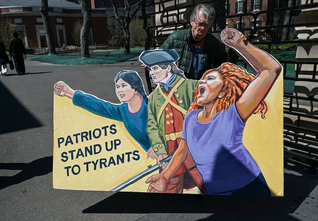 David Fichter of Cambridge, Massachusetts, a 1973 graduate of Harvard University, leaves a protest against President Donald Trump's administration and against student visas being revoked, at Harvard University in Cambridge on Thursday.