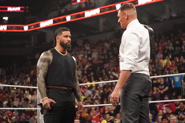 Gunther (right) and Jey Uso face off during WWE Raw at Target Center on April 7, 2025 in Minneapolis, Minnesota.