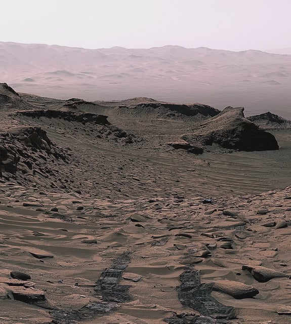 NASA’s Curiosity Mars rover sees its tracks receding into the distance at a site nicknamed “Ubajara” on April 30, 2023. This site is where Curiosity made the discovery of siderite, a mineral that may help explain the fate of the planet’s thicker ancient atmosphere. Credit: NASA/JPL-Caltech/MSSS