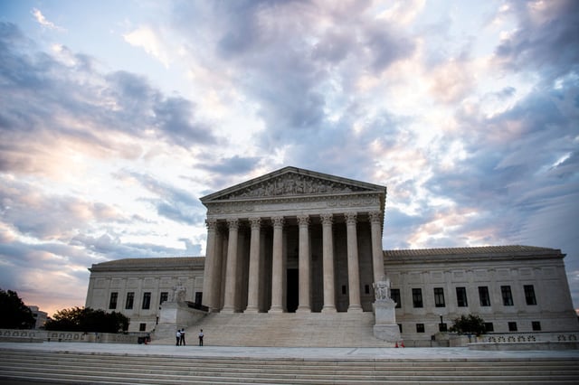 The Supreme Court building is seen at sunrise.