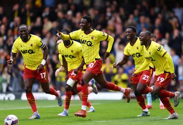 Soccer Football - Championship - Watford v Burnley - Vicarage Road, Watford, Britain - April 18, 2025 Watford's Mamadou Doumbia celebrates scoring their first goal with teammates Action Images/Matthew Childs EDITORIAL USE ONLY. NO USE WITH UNAUTHORIZED AUDIO, VIDEO, DATA, FIXTURE LISTS, CLUB/LEAGUE LOGOS OR 'LIVE' SERVICES. ONLINE IN-MATCH USE LIMITED TO 120 IMAGES, NO VIDEO EMULATION. NO USE IN BETTING, GAMES OR SINGLE CLUB/LEAGUE/PLAYER PUBLICATIONS. PLEASE CONTACT YOUR ACCOUNT REPRESENTATIVE FOR FURTHER DETAILS..