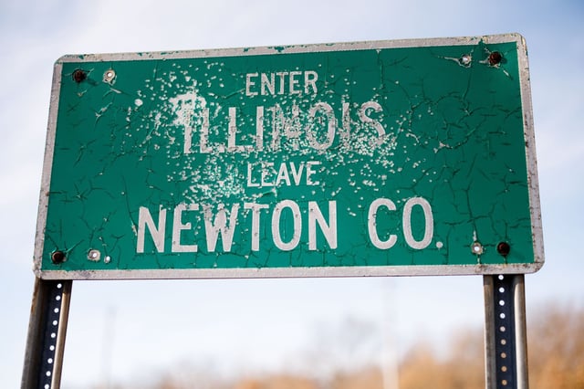 An Illinois sign greets travelers near County Road 3200 East near the border with Indiana, Jan. 29, 2025, in Iroquois County, Illinois. (Armando L. Sanchez/Chicago Tribune)