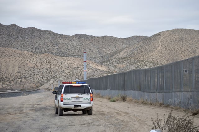 FILE - A U.S. Border Patrol agent patrols Sunland Park along the U.S.-Mexico border next to Ciudad Juarez in New Mexico, Jan. 4, 2016. (AP Photo/Russell Contreras, file)