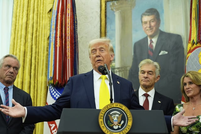 President Donald Trump speaks as Health and Human Services Secretary Robert F. Kennedy Jr., from left, Dr. Mehmet Oz and Oz's wife Lisa Oz listen during a swearing in ceremony for Mehmet oz to be Administrator of the Centers for Medicare and Medicaid Services, in the Oval Office of the White House, Friday, April 18, 2025, in Washington. (AP Photo/Alex Brandon)