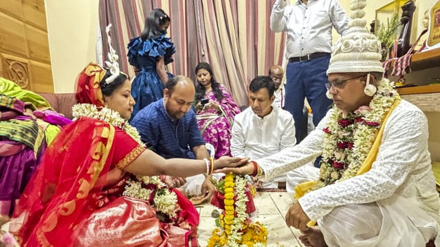 BJP leader Dilip Ghosh and Rinku Majumdar during their marriage, in Kolkata, Friday.