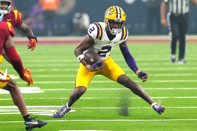 Sep 1, 2024; Paradise, Nevada, USA; LSU Tigers wide receiver Kyren Lacy (2) runs with the ball against the Southern California Trojans during the second quarter at Allegiant Stadium. Mandatory Credit: Stephen R. Sylvanie-USA TODAY Sports/File Photo