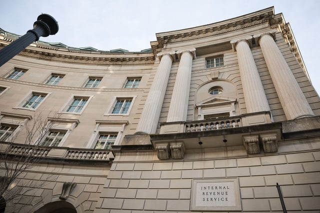 A sign for the Internal Revenue Service (IRS) is seen on its building on February 13, 2025 in Washington, DC. Members of Elon Musk's Department of Government Efficiency (DOGE) arrived at the Internal Revenue Service to begin examining the agency's operations.