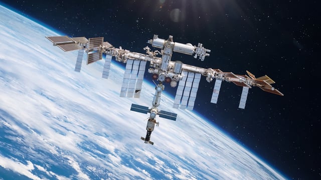 The ISS orbiting Earth.