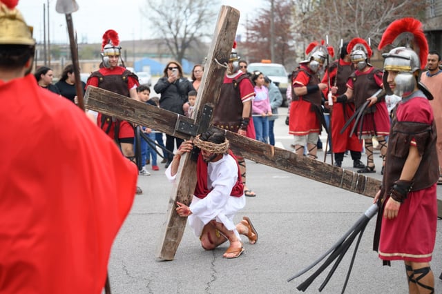 East Chicago resident Eron Herrejon, playing Jesus, acts out a station of the cross during Our Lady of Guadalupe East Chicago&#39;s annual Way of the Cross procession on Good Friday, April 18, 2025. (Kyle Telechan/for the Post-Tribune)