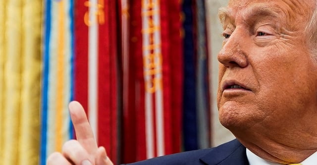 U.S. President Donald Trump gestures during a swearing-in ceremony for Administrator of the Centers for Medicare and Medicaid Services Mehmet Oz in the Oval Office in Washington, D.C., U.S., April 18, 2025. REUTERS/Nathan Howard