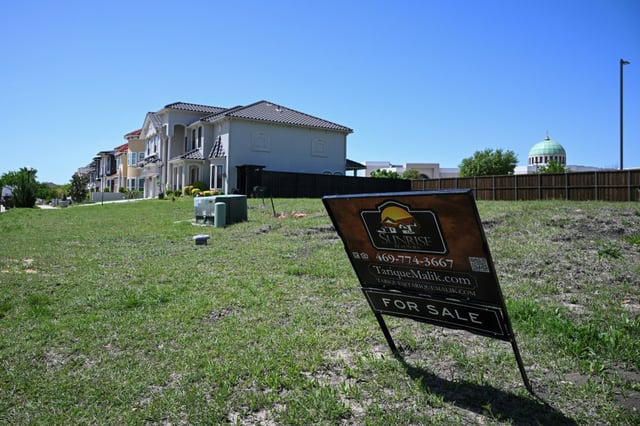 Land for sale is seen near the mosque of East Plano Islamic Center, where a major expansion is planned -- but meeting resistance from other Texans