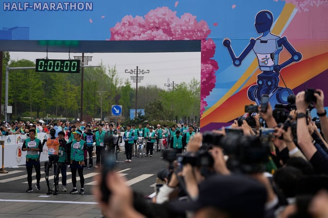 Robots take part in what is billed as the world's first robot half marathon during the Humanoid Robot Half-Marathon held in Beijing, China, on April 19, 2025.