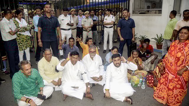 West Bengal BJP President and Union Minister Sukanta Majumdar, along with victims of Murshidabad violence, during a sit-in protest outside Bhawani Bhawan on April 16.