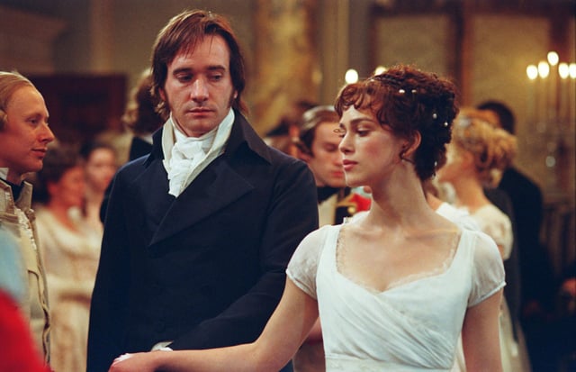 Mr. Darcy and Elizabeth banter while dancing at a ball.