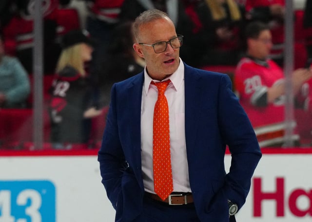 Jan 11, 2024; Raleigh, North Carolina, USA; Anaheim Ducks head coach Greg Cronin walks off the ice after the Ducks loss to the Carolina Hurricanes at PNC Arena. Mandatory Credit: James Guillory-USA TODAY Sports/File Photo