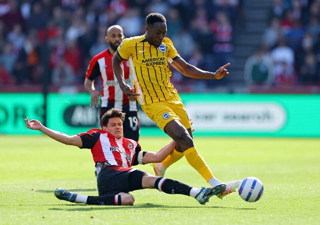 Soccer Football - Premier League - Brentford v Brighton & Hove Albion - GTech Community Stadium, London, Britain - April 19, 2025 Brighton & Hove Albion's Danny Welbeck in action with Brentford's Christian Norgaard REUTERS/Toby Melville