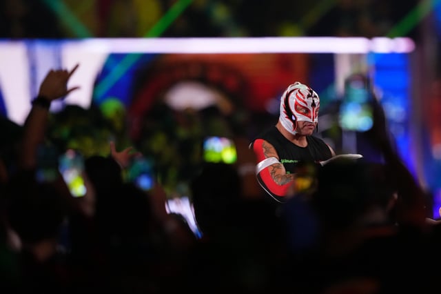 Rey Mysterio makes his entrance during the Men’s Royal Rumble match during the WWE Royal Rumble at Lucas Oil Stadium.