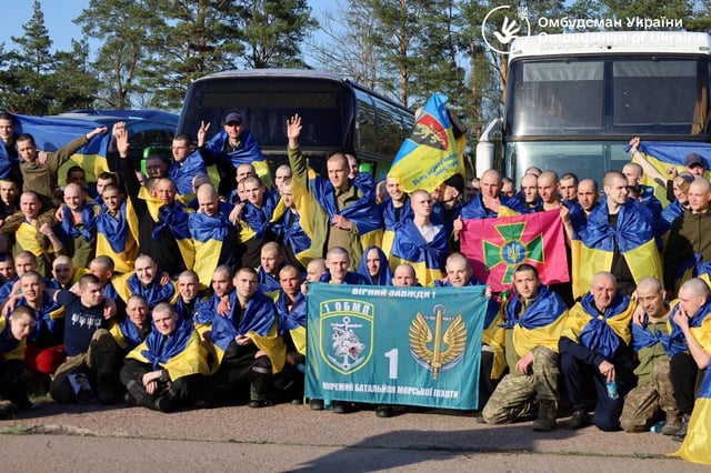 Ukrainian prisoners of war (POWs) pose for a picture after a swap, amid Russia's attack on Ukraine, in an undisclosed location, Ukraine April 19, 2025. Ukrainian Human Rights Ombudsman Dmytro Lubinets via Telegram/Handout via REUTERS