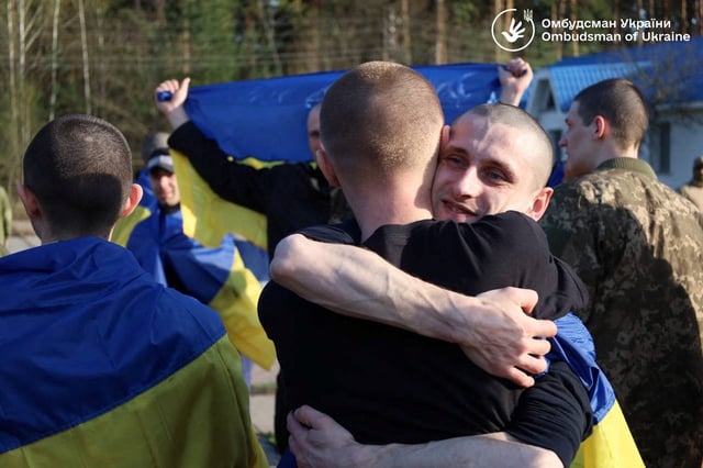 Ukrainian prisoners of war (POWs) react after a swap, amid Russia's attack on Ukraine, in an undisclosed location, Ukraine April 19, 2025. Ukrainian Human Rights Ombudsman Dmytro Lubinets via Telegram/Handout via REUTERS