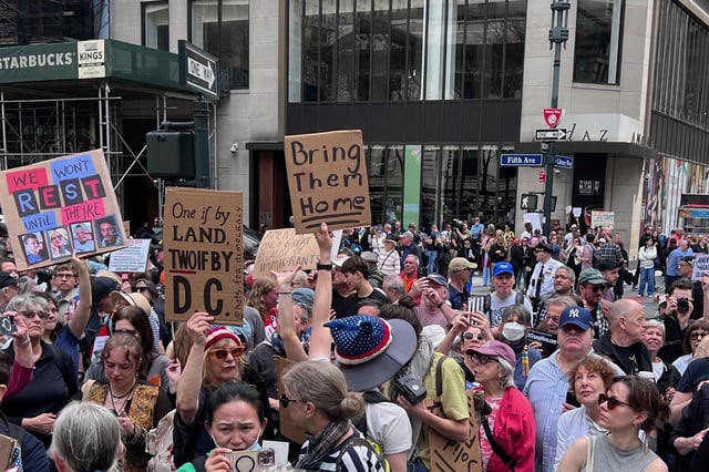 People gather to protest President Donald Trump's policies on Saturday, April 19, 2025 in New York. (AP Photo/Joseph Frederick)