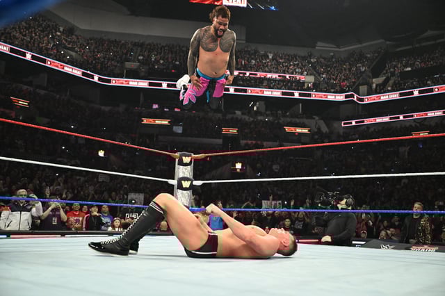 SAN ANTONIO, TEXAS - JANUARY 25: Jey Uso aims an Uso Splash at Gunther during Saturday Night&#39;s Main Event at Frost Bank Center on January 25, 2025 in San Antonio, Texas.