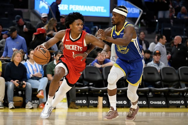 Houston Rockets forward Amen Thompson, dribbling around Jimmy Butler, will be one of the primary defenders harassing the Warriors’ Stephen Curry.