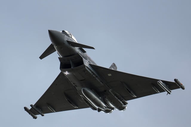 A British Royal Air Force Eurofighter Typhoon fighter aircraft flies at RAF Coningsby on May 16, 2023 in Coningsby, England.