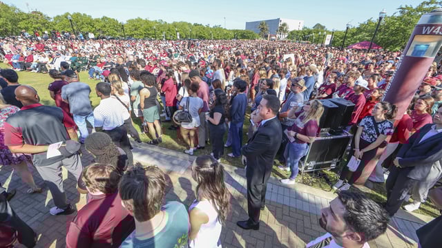 The day after an active shooter on campus Florida State held a vigil on campus at Langford Green, Tallahassee, Fla., Friday, April 18, 2025. (AP Photo/Gary McCullough)
