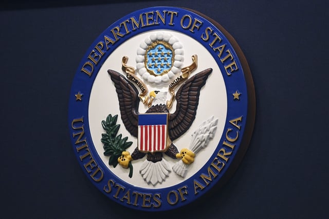 The State Department seal is seen on the briefing room lectern ahead of a briefing by State Department spokesperson Ned Price at the State Department in Washington, Monday, Janu 31, 2022.