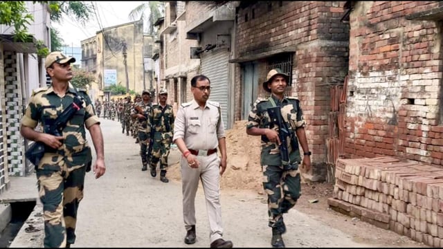 Security personnel keep vigil in Murshidabad on Sunday. (PTI)