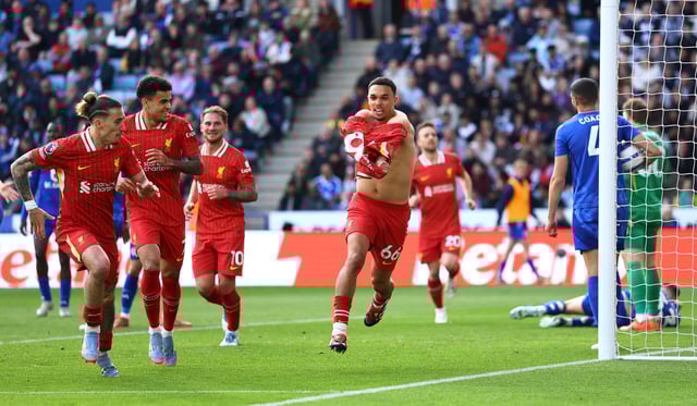 Soccer Football - Premier League - Leicester City v Liverpool - King Power Stadium, Leicester, Britain - April 20, 2025 Liverpool's Trent Alexander-Arnold celebrates scoring their first goal with Liverpool's Kostas Tsimikas and Liverpool's Luis Diaz Action Images via Reuters/Andrew Boyers EDITORIAL USE ONLY. NO USE WITH UNAUTHORIZED AUDIO, VIDEO, DATA, FIXTURE LISTS, CLUB/LEAGUE LOGOS OR 'LIVE' SERVICES. ONLINE IN-MATCH USE LIMITED TO 120 IMAGES, NO VIDEO EMULATION. NO USE IN BETTING, GAMES OR SINGLE CLUB/LEAGUE/PLAYER PUBLICATIONS. PLEASE CONTACT YOUR ACCOUNT REPRESENTATIVE FOR FURTHER DETAILS..
