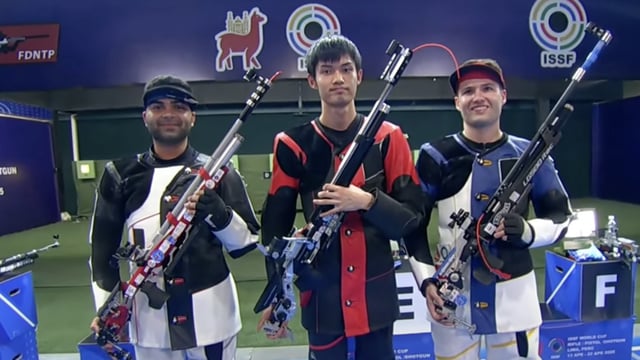 (L-R)- Arjun Babuta, Sheng Lihao & Istvan Peni after the men’s 10m air rifle final at the Las Palmas range in Lima, Peru on Saturday. (ISSF)