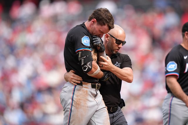 Apr 19, 2025; Philadelphia, Pennsylvania, USA; Miami Marlins outfielder Griffin Conine (18) leaves the field after an injury against the Philadelphia Phillies in the sixth inning at Citizens Bank Park. Mandatory Credit: Kyle Ross-Imagn Images/File Photo