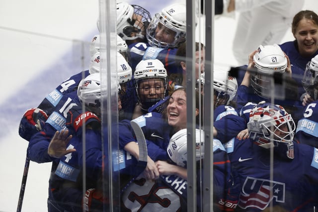 Ice Hockey - IIHF Women's World Championships - Gold Medal Game - United States v Canada - Budvar Arena, Ceske Budejovice, Czech Republic - April 20, 2025 Tessa Janecke of the U.S. celebrates scoring their fourth goal with teammates REUTERS/David W Cerny