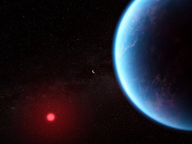 An artist's concept shows what exoplanet K2-18 b could look like based on science data.