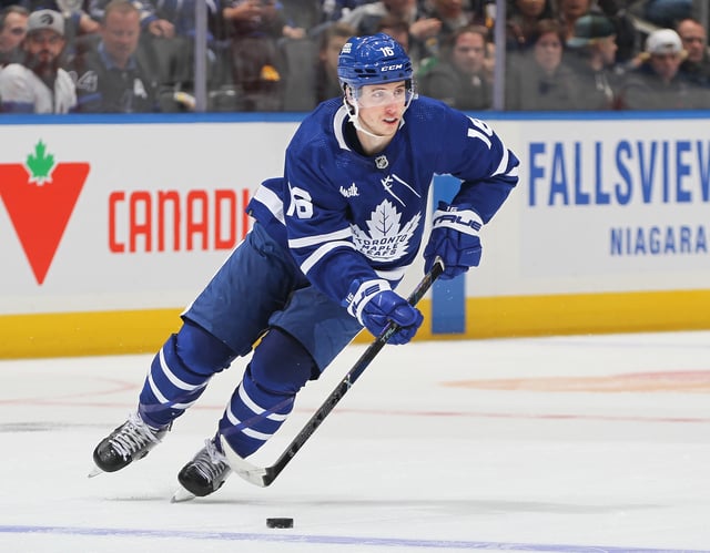 Mitchell Marner #16 of the Toronto Maple Leafs skates the puck in overtime against the Pittsburgh Penguins at Scotiabank Arena on April 8, 2024 in Toronto, Ontario, Canada. The Maple Leafs defeated the Penguins 3-2 in overtime.
