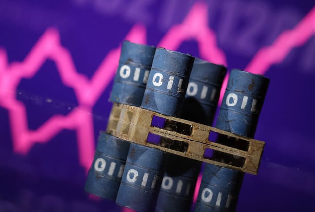 Miniatures of oil barrels and a rising stock graph are seen in this illustration taken January 15, 2024. REUTERS/Dado Ruvic/Illustration/File Photo