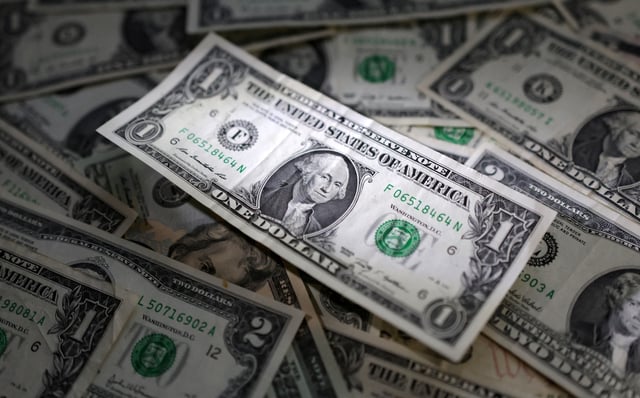 U.S. dollar banknotes are seen in this illustration taken March 10, 2023. REUTERS/Dado Ruvic/Illustration